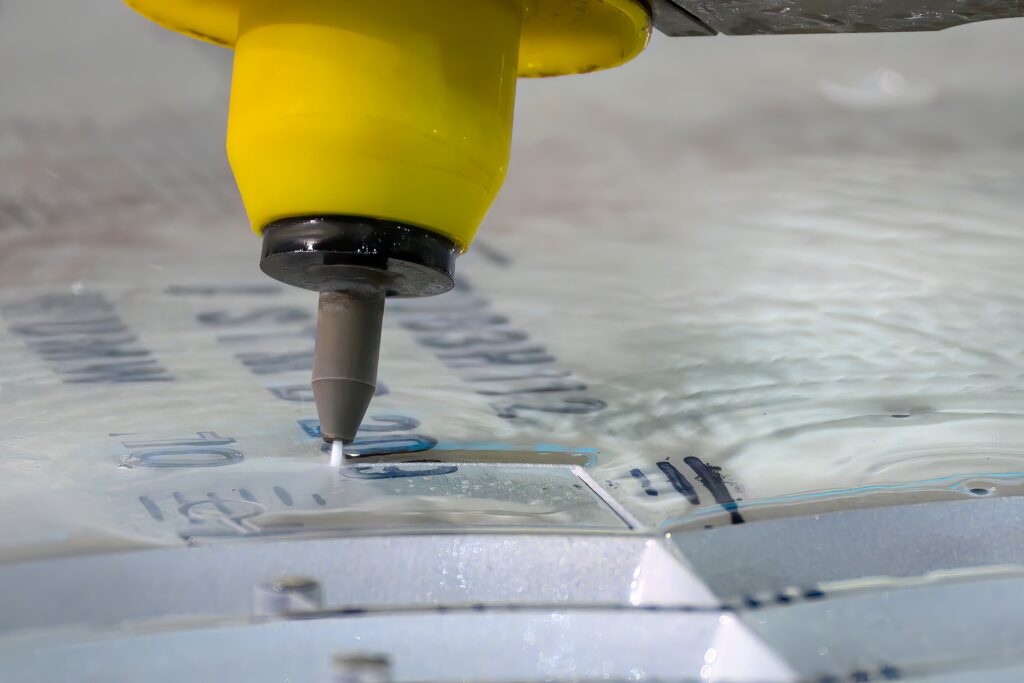 close up,scene,of,multi axis,abrasive,waterjet,cutting,machine,cutting,the
